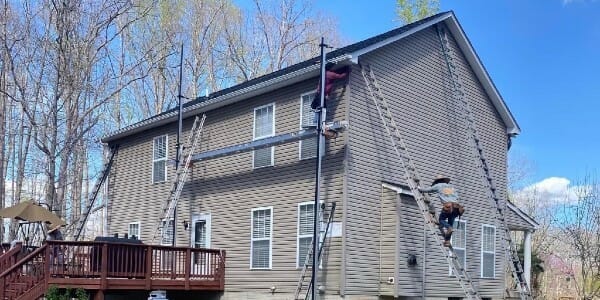 New siding and gutters on large home